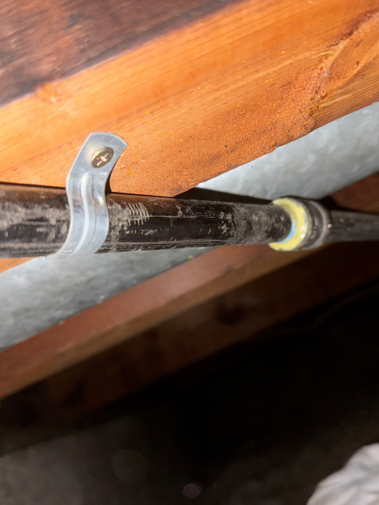 gas pipe mounting under the floor