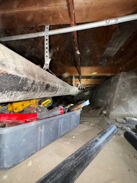 repair of a sewer pipe under the floor