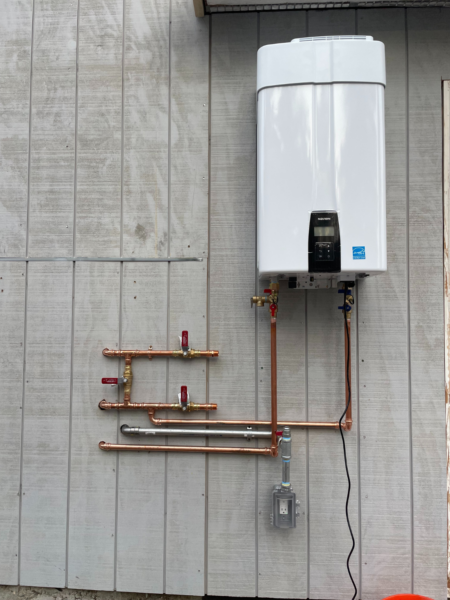 gas boiler mounted on the wall outside