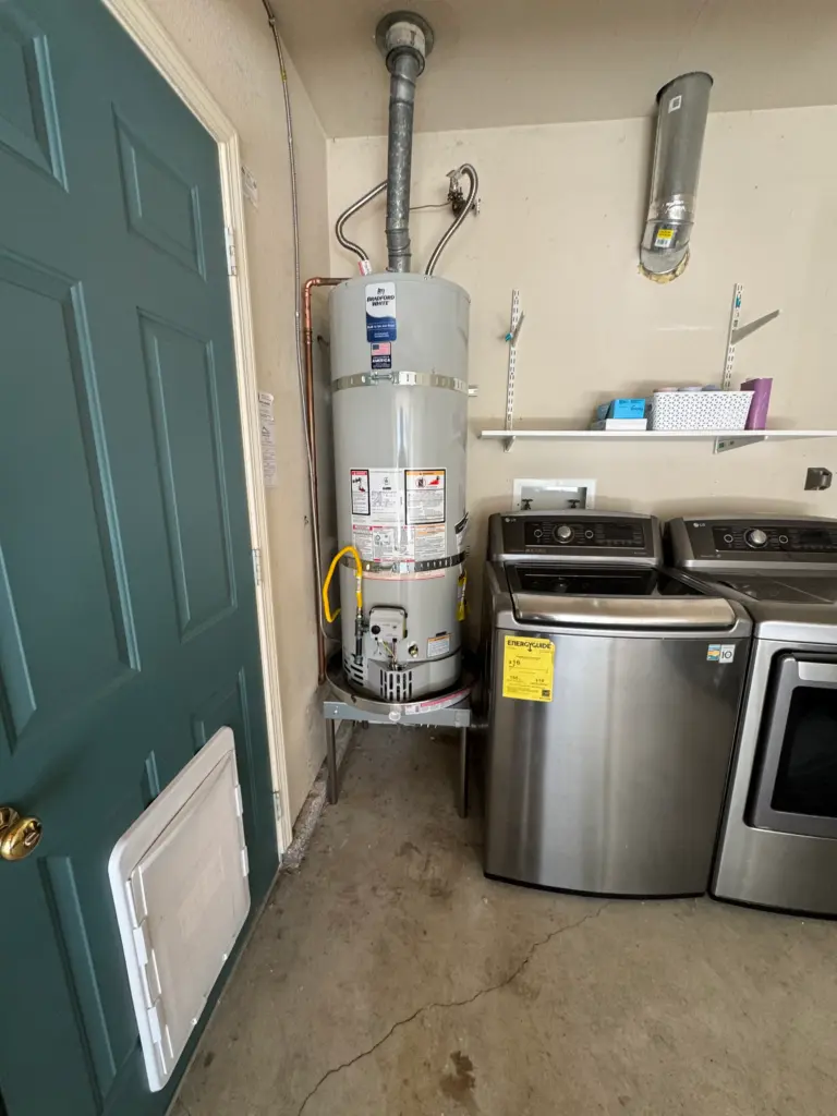 Bradford White 40 gallon water heater in a utility area