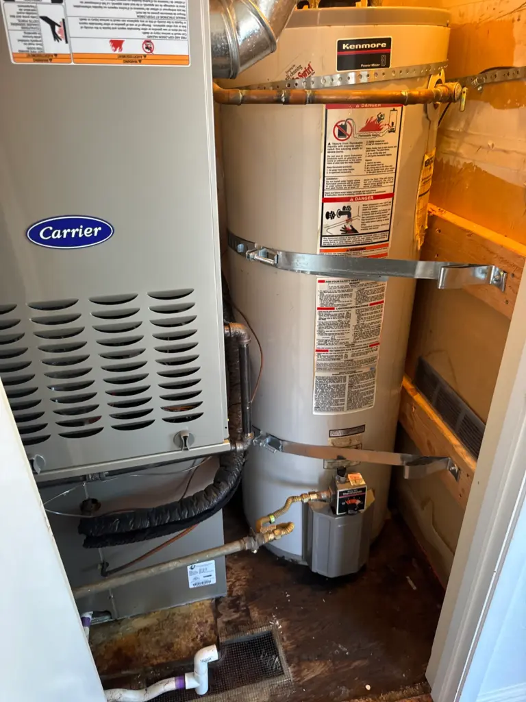 Bradford White 50 gallon water heater installed in a utility closet