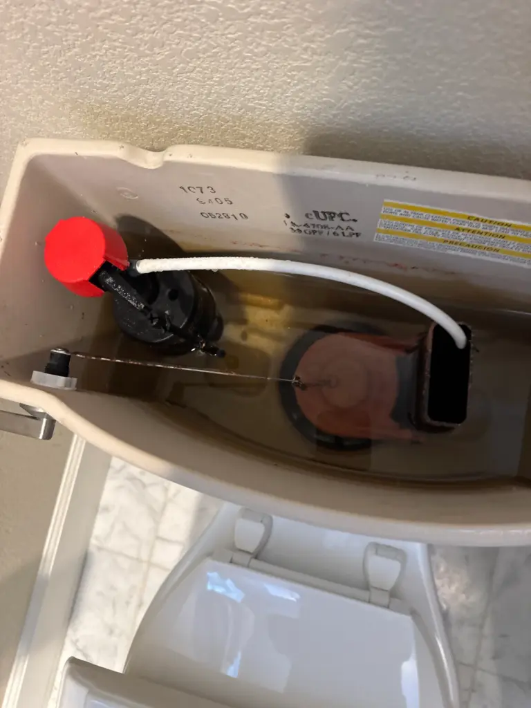 Toilet fill valve replaced inside a toilet tank