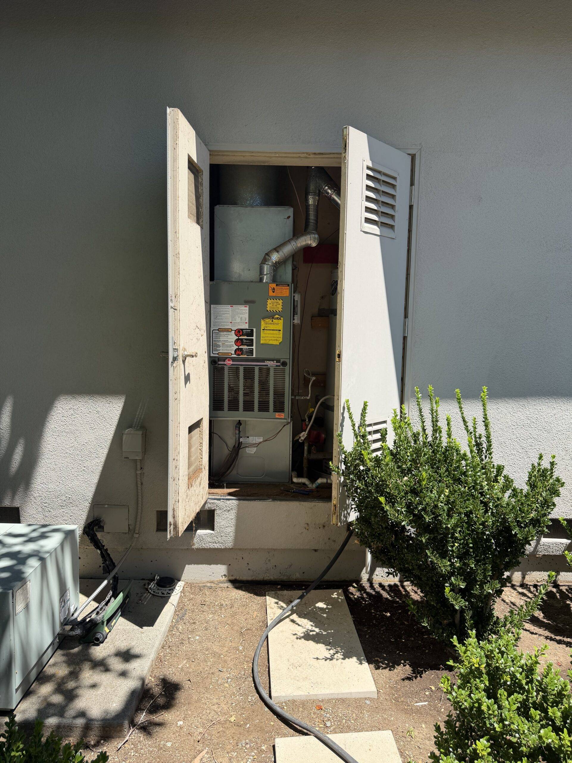 Water heater flushing equipment connected for maintenance
