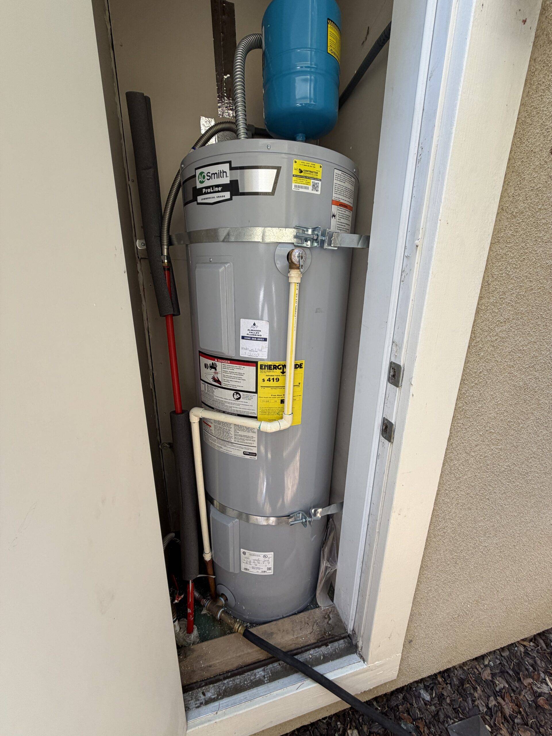 Water heater electrical connection inspected during flush service