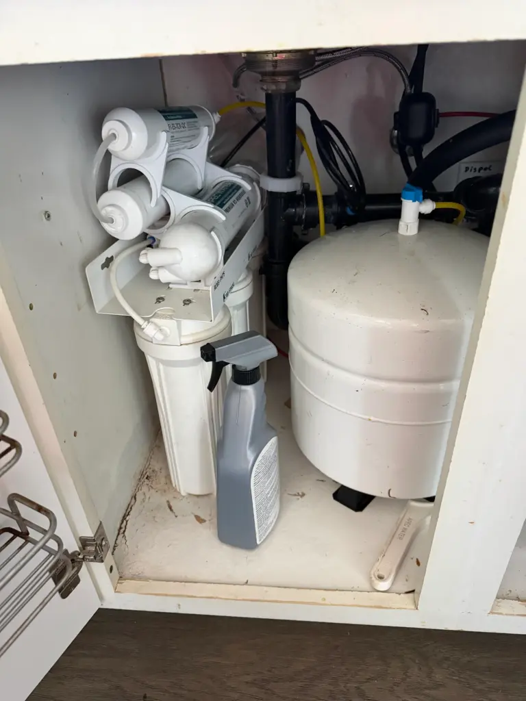 Reverse osmosis system components replaced under a sink