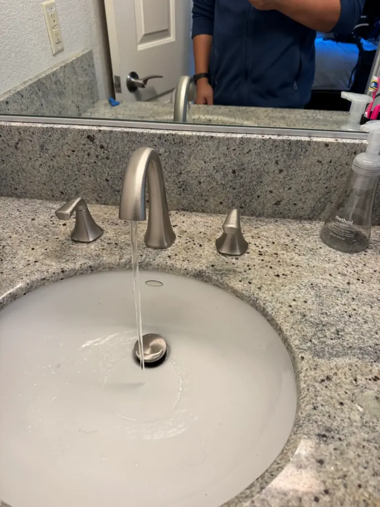 Bathroom vanity faucet replaced at a sink