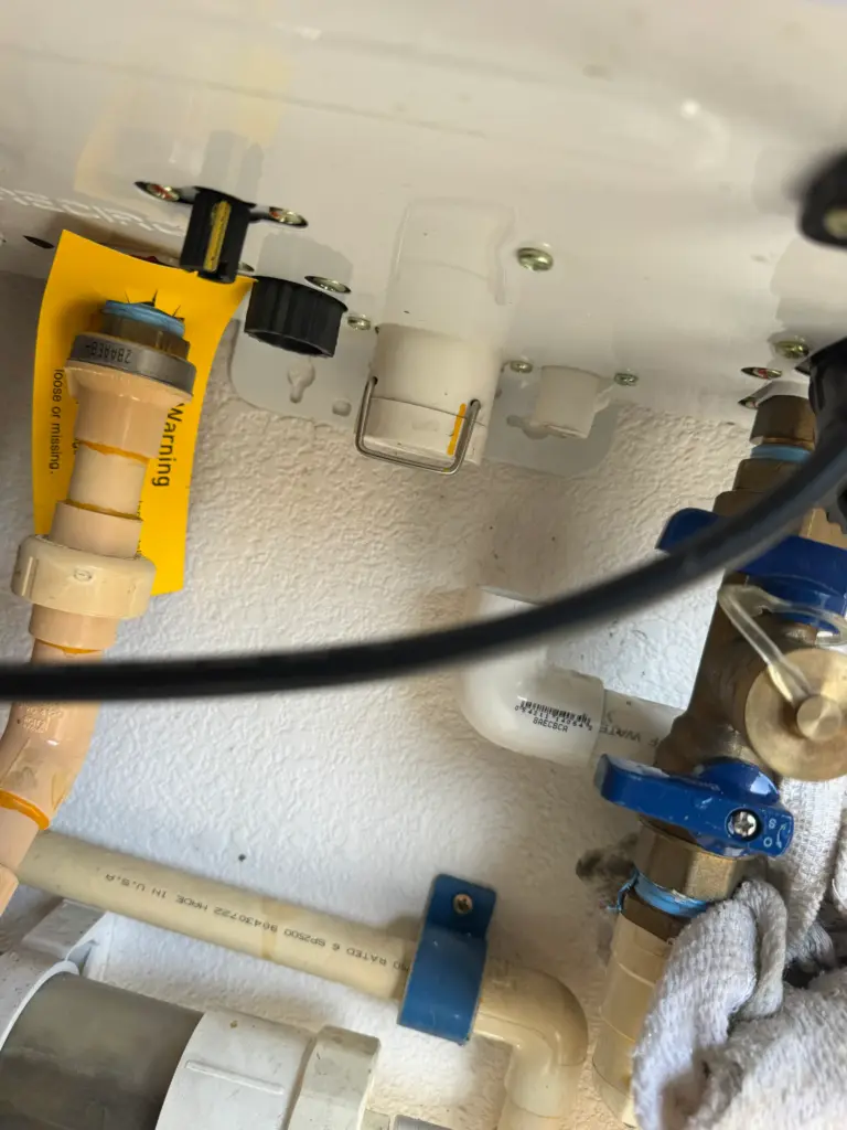 Water heater exhaust vent pipe being replaced
