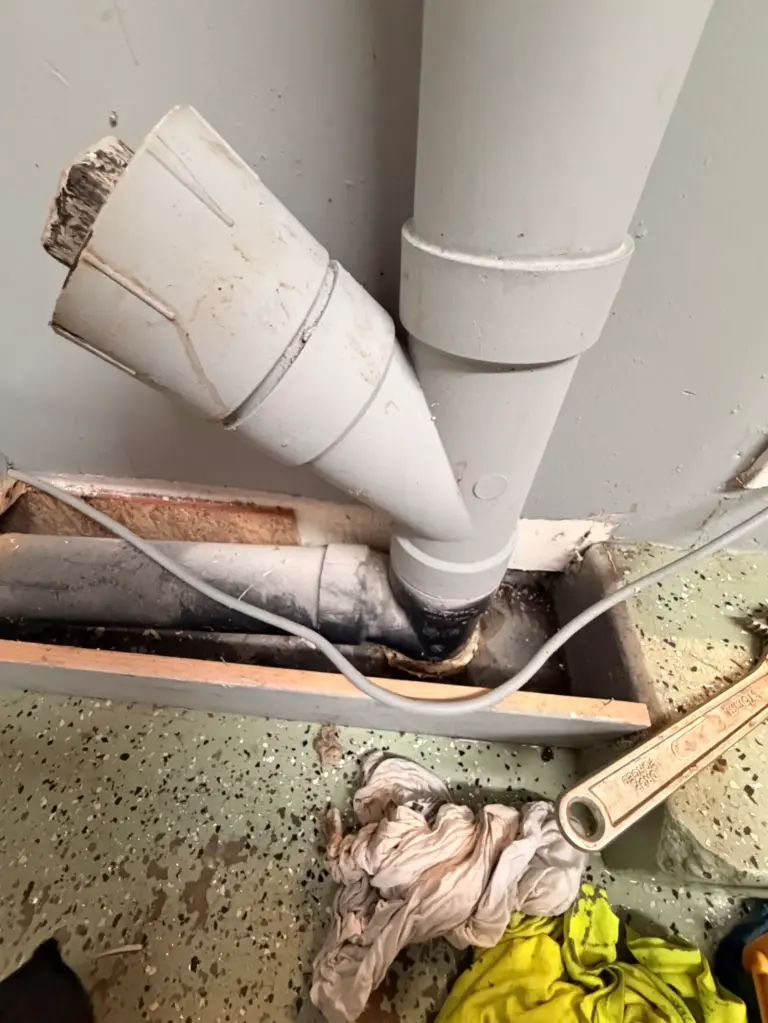 Main drain line repaired beneath a residential floor