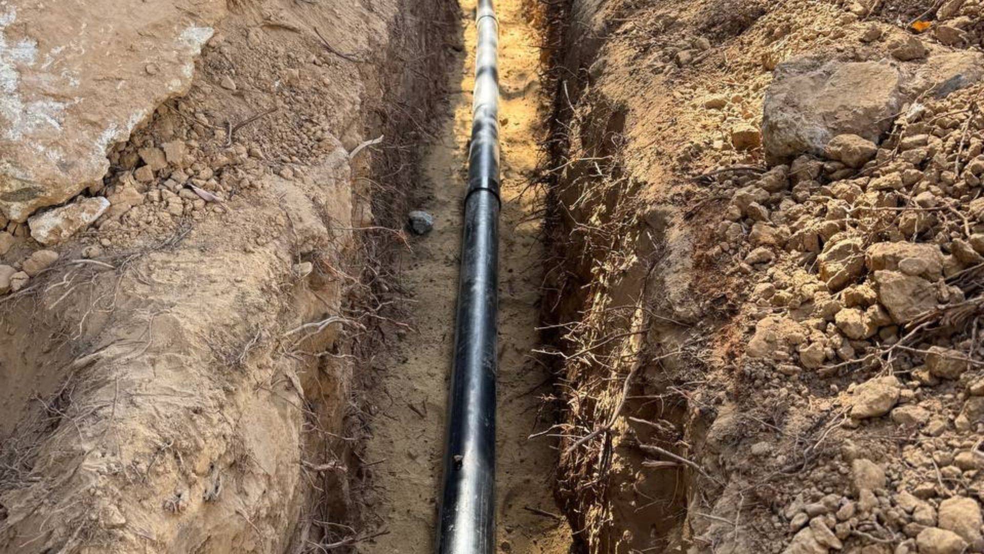 New sewer line installed in an excavated trench